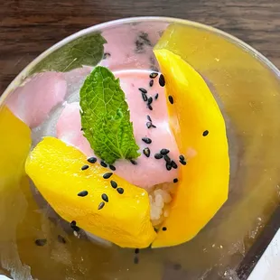 coconut sticky rice with fresh Mango and a strawberry cream