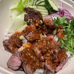 a plate of meat and vegetables