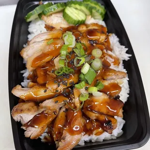 chicken and broccoli on a bed of rice