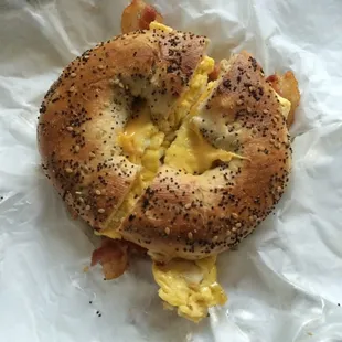 Bacon egg and cheese on an &quot;everything&quot; bagel