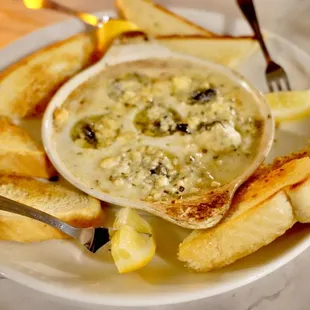 a bowl of soup and bread