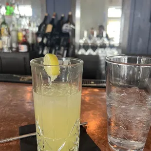 a glass of lemonade and a glass of water