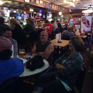a group of people sitting at a table