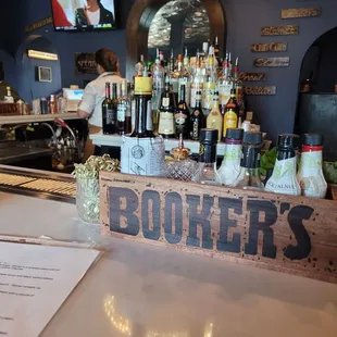 a bar with bottles of liquor