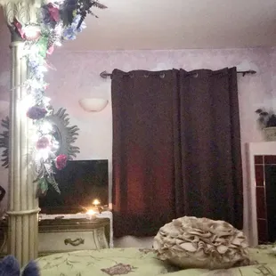 Sunset Room, also has a little side room with couches, chairs, and a table, plus a gorgeous bathroom with a jacuzzi!