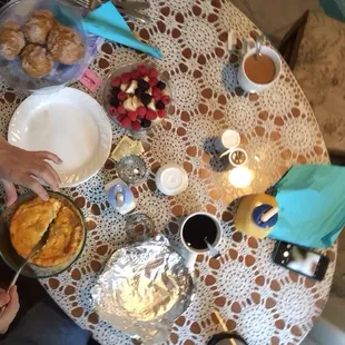 In the room Breakfast -delivered in a wicker basket .  Egg casserole, fresh pumpkin muffins, fruit, coffee, oh so good.
