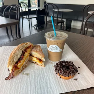 a breakfast sandwich and coffee
