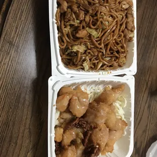 two take out containers of food