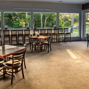 dining area with tables and chairs
