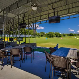 a view of a green golf course