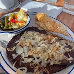 Liver and onions with fried mashed potatoes and mixed veggies