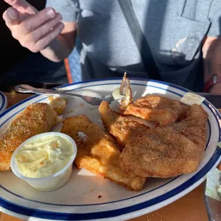 Perch dinner with fried mashed potatoes.