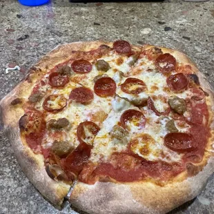 Italian Pizza. Pepperoni and Italian Sausage.