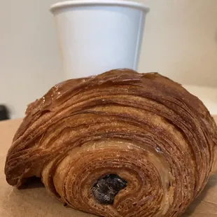 Chocolate croissant and a chai latte