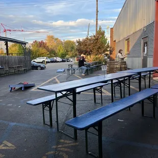 tables and benches in a parking lot