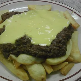 Spicy *NACHO* cheese sauce on my "Chili Cheese" Fries?