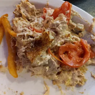 a plate of food with french fries