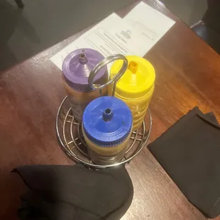 Purple (Vinegar based bbq)  Blue (Original based bbq)  Yellow (Mustard based bbq)   3 meat 2 side platter was $34