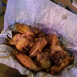 a basket of chicken wings