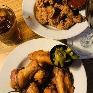 Gator Bites and Wings with Blue Cheese. Not too spicy but with the right amount.