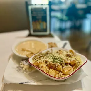 Lunch special - build your own pasta. This one is shrimp &amp; crab angel hair pasta with scampi sauce. Lobster bisque on the side.
