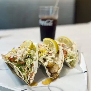 Taco Tuesday! $4 each - shrimp and fish tacos. Delicious! Stuffed to the top!