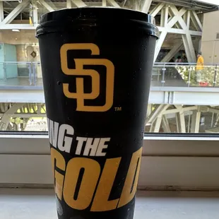 a coffee cup with the san diego logo on it