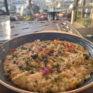 Butternut squash risotto with edible flowers