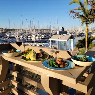 Shelter Island Marina below the restaurant deck.  Home of Next Level Sailing.  Guaranteed whale sightings 365 days a year.