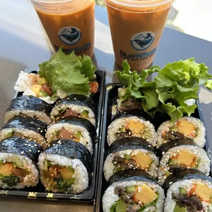 two sushi rolls and a drink
