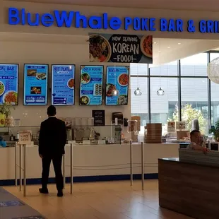 a man standing in front of the counter