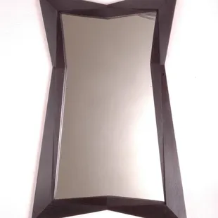 This pseudo-cubist mirror frame was exclusively designed for The Kubista Gallery in Prague. Two sizes-large and small. Only a limited amo