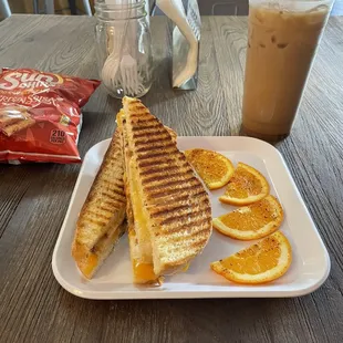 Chicken Panini. Comes with chips.  Iced Vanilla latte with almond milk