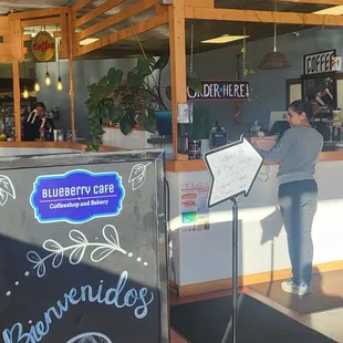 As you walk into the Blueberry Cafe.