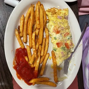 omelette with fries.