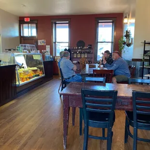 two men sitting at a table