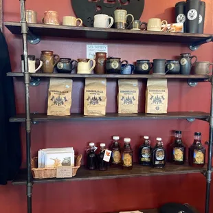 shelves of coffee, honey, and other items