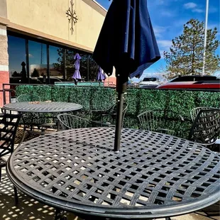 a patio table with an umbrella