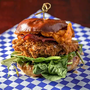 a chicken sandwich with lettuce and bacon