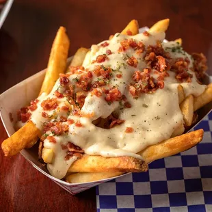 french fries with cheese sauce and bacon