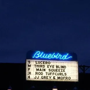 the neon sign for bluebird