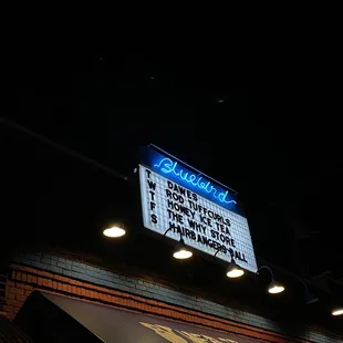 the neon sign for the restaurant