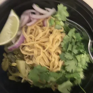 Khao soi before adding yellow curry soup and fried noodles.