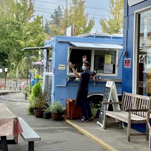 The cart in its new location at the Multnomah village French quarter. I happened to capture the owner Alex in my pic! Super nice people