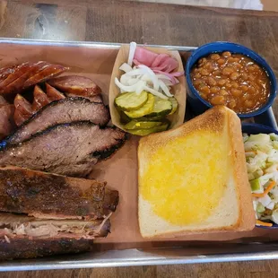 a tray of barbecue food