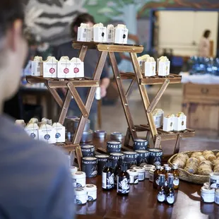 a table full of jars of jams