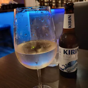 Glass of wine and Kirin light
