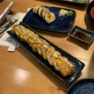 Deep fried Las Vegas roll and California roll and smoked salmon roll