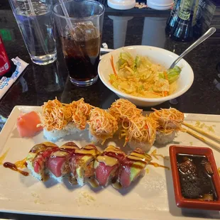 Rainbow Rainbow Sushi Roll and Crab Bang Sushi Roll, with at least two pieces already eaten plus the House Ginger Salad!