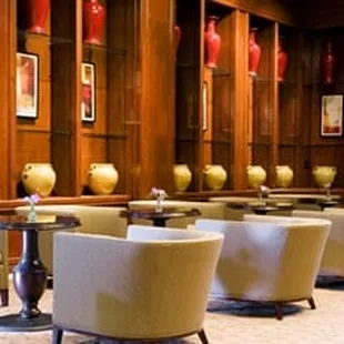 a row of chairs in a hotel lobby